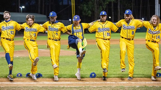 Savannah Bananas' Mat Wolf throws between his legs, with or without pants, for strikes