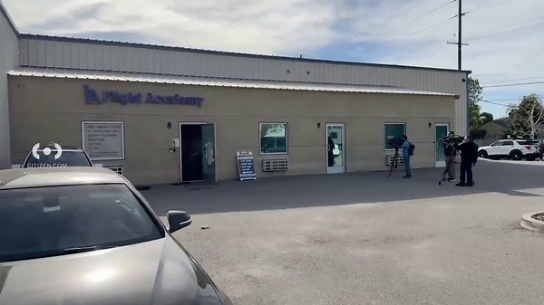 Hijacked plane crashes into Van Nuys airport building