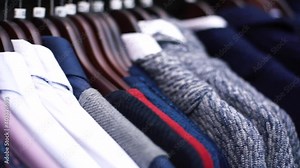 Various types of shirt for men on hanger. The solution for most men is an education in fabrics. Research on the influence of fabric color and quality properties on mens suits.
