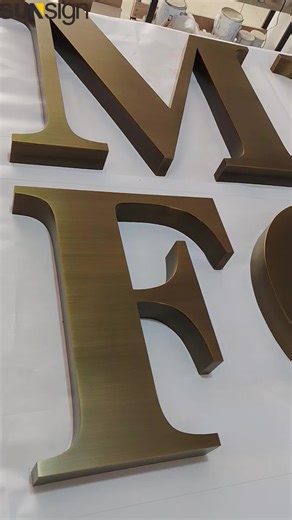 Stainless steel channel letters are a luxurious and elegant way to showcase your brand. The warm, rich tones of the metal create a sophisticated look that is sure to impress. The letters are also very durable and long-lasting, making them a great investment for your business. ✨ WhatsApp: 1(646) 418-9907 ✨ Email: heidi@sunsignad.com #customsignage #logosign #3dsign #signagefactory #signmakers #shopsign #stainlesssteelletters #channelletters #signage #metalsign #customletters #brushedfinish #compa
