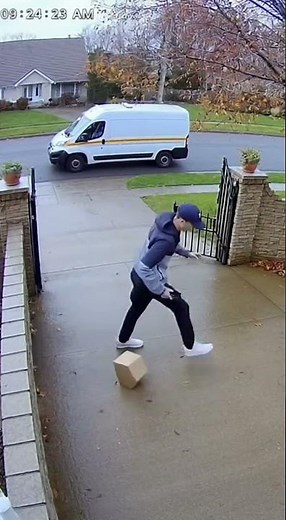CCTV Captures Delivery Man Chasing Rolling Package — Realistic 4 K Footage