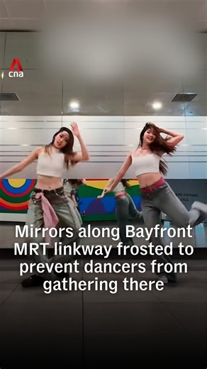 Dancers who regularly practise at the underground walkway near Bayfront MRT will need to find a new spot after the full-length mirrors lining the space were frosted on Jan 1. Marina Bay Sands said it acted on public feedback “to facilitate seamless pedestrian flow”. The move has drawn mixed reactions online. #singapore #sgnews | CNA