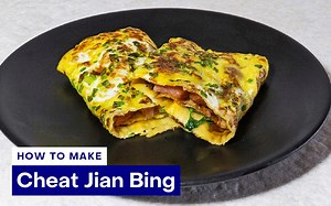 Jian bing is savory breakfast crepe with the works—fried wonton wrappers, eggs, hot sauce—that's popular in Chinese street food carts. 🥞 Since we can't fly out to have it, here's a cheat recipe so everyone can make it at home! ✈️ Check the comments for the full instructions. 👇🏼 📩 DM us if you have any q's! 📌 Tag us if you make it! #PepperPH #chinese #streetfood #jianbing #crepes #chinesefood | Pepper.ph