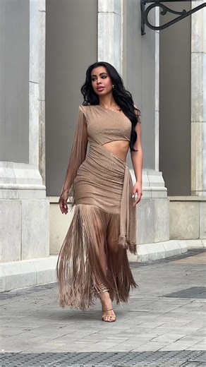 ✨ She’s BACK for NYE. Fringe that moves like midnight magic. Restocked now, don’t blink. 🥂 🔍 Can't Look Back Fringes Maxi Dress Gold