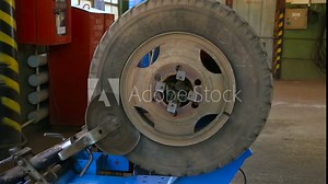Disassembling the truck's wheel of the machine