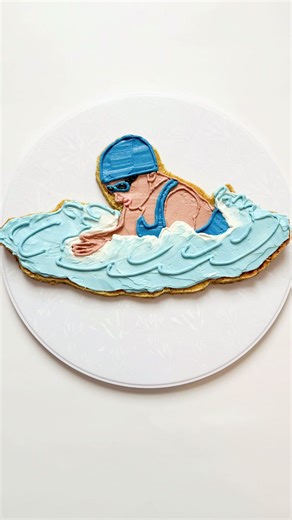 Testing a new sugar cookie flavor meant I needed a fun cutout… so a swimmer felt just right 🏊‍♀️ From swimming my whole life, to getting back in the water with an adult swim team, to gifting cookies to a fellow swimmer 💙 Cheers to your passions, old and new ✨ #CookieArtist #SugarCookieCake #SwimmerLife #AdultSwimTeam #BakersOfTikTok