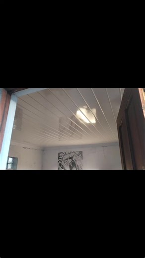 Elegant Glossy White PVC Ceiling Installation