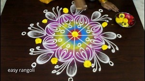 1.3M views · 10K reactions | Simple color rangoli kolam designs decorated with flowers My Instagram ID https://www.instagram.com/easyrangolisuneetha/ #kolam #rangoli #muggulu #easyrangoli #easyrangolisuneetha | Easyrangoli suneetha | Facebook