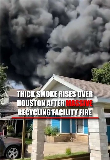 A large fire erupted at a recycling facility in Houston that sent thick black smoke towering over southeast Houston, with the plume visible for miles across the city. Around 100 firefighters responded to the raging fire, forcing crews to monitor air quality and water runoff as they worked to contain the blaze. Officials say no injuries have been reported.