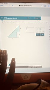 A rectangle is removed from a right triangle to create the shad... | Filo