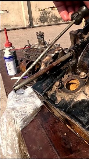 Engine oil dipstick tube removal short