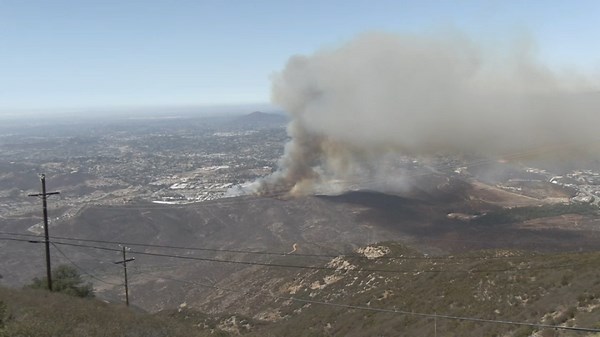 Evacuations lifted for Spring Valley brush fire as crews stop forward progress
