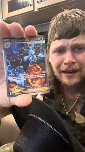 Man pulls charizard and starts crying😳 #shorts