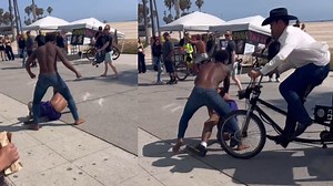 Man breaks up brawl by driving bike cab into fight in Los Angeles