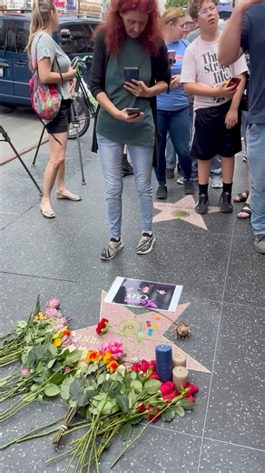 People visit Ozzy Osbourne's star at the Hollywood Walk Of Fame on July 22, 2025 in Los Angeles, California. John Michael "Ozzy" Osbourne was the frontman of the Heavy Metal band Black Sabbath in the 1970s and became a worldwide icon. Black Sabbath had just played their last concert on July 5, at Villa Park in Birmingham, UK. (Footage by Robert Gauthier/Los Angeles Times via Getty Images) | Joel King