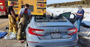 Driver dead after collision with school bus near Fairview
