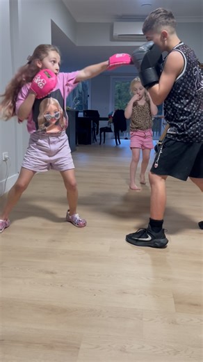 Adam Ibrahim on Instagram: "Coach Ava helping big bro level up 🥊💯 #boxing #boxingtraining #kidsboxing #boxingdrills #fitnessmotivation #nz #usa #mexico #argentina #padwork #stronggirls #selfdefense"
