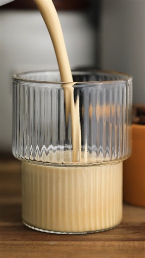 Skip the trip to the coffee shop and pull perfect Nitro Cold Brew shots at home with the Slide & Lock™ Espresso Maker. https://bit.ly/3F7OaRA | Hamilton Beach