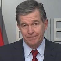 Cooper commutes sentences and issues pardons of forgiveness