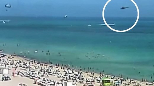 Helicopter crashes into water at south beach Florida