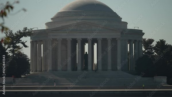A view of the Jefferson Memorial, a neoclassical rotunda in Washington D.C., featuring its iconic columns and dome.