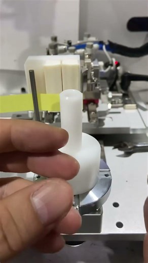 Adhesive tape winding machine