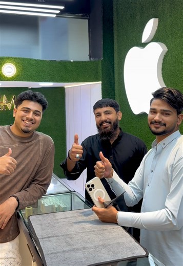 Happy Customer with iPhone 14 Pro Max in Gold