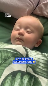 Dad reacts when he realizes his baby is only pretending to sleep