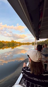 We love a bit of billabong bliss 🧡 Join the crew at Yellow Water Cruises to drift through our wildlife-filled Kakadu National Park 🌅 🎥: IG/ntaustralia 📍: Yellow Water Billabong (Kakadu Tourism. The Spirit of Kakadu), Kakadu National Park, Tourism Top End, Northern Territory – Australia #SeeAustralia #ComeAndSayGday #TourismTopEnd ID: A person seated on the edge of a large, open boat as they admire scenes of trees reflecting on a glassy billabong. | Australia.com