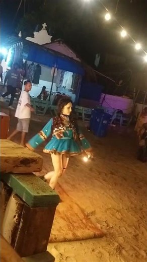 russian lady fire dance in goa arjuna beach