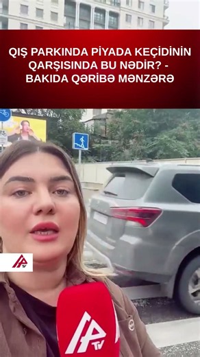 APA TV-nin əməkdaşı yeraltı keçidin qarşısına torpaq kisələri düzülən ərazidədir