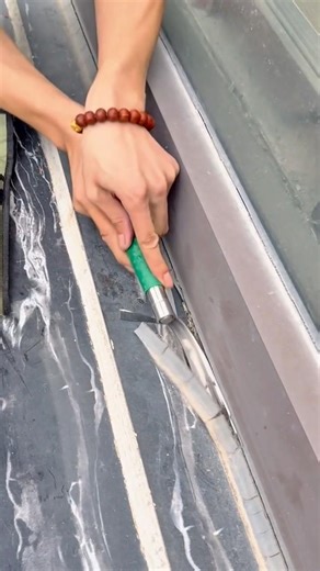 Carefully Removing Old Sealant from a Narrow Surface Using a Precision Hand Scraper Tool #shorts