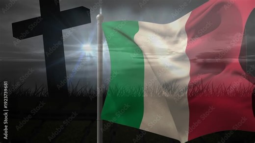 Wind gusts starting, tricolor flag rippling and folding, revealing and concealing cross and grass