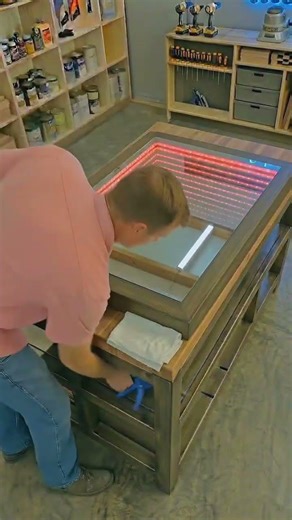 Infinity Mirror Wall That Looks Like a Deep Tunnel