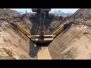 Precision Ditch Digging: CAT 323D Excavator in Action