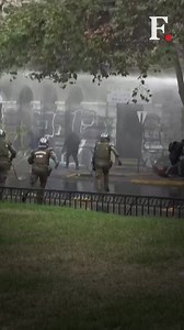 2.6K views | #FPReels: Students in #Chile faced-off with police during a march against #policereforms. The new law grants officers more powers and increases penalties for crimes against police. Amnesty International said the law could "increase police abuse and impunity". | Firstpost | Facebook