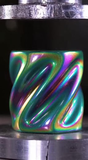 Watch this stunning iridescent ceramic helix block get slowly crushed under extreme pressure. The satisfying folding crunch and smooth snap create perfect ASMR as thick curved pieces settle with gentle ceramic knocks.