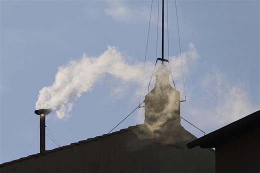 New Pope Elected, White Smoke Billows from Vatican Chimney