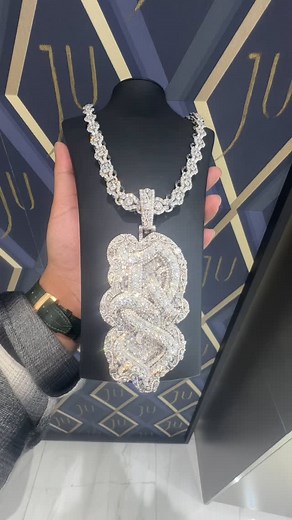 Jewelry Unlimited on Instagram: "@1deebosr went boulders for the bday. Featured in this custom DS pendant is large rbc pointers in top layer, with an emerald cut background, bezel set multi shape Mosiac on the border and side profile."