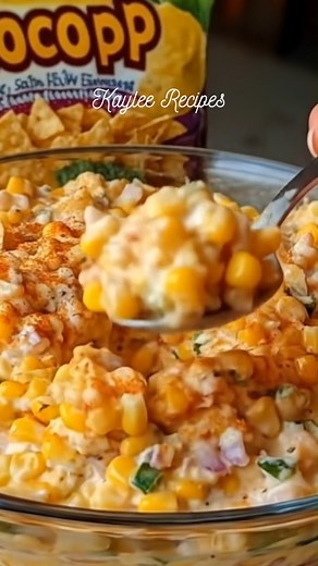 Mexican Street Corn Dip 🌽🤤 Ingredients 📝 2 cans Mexicorn, drained 1 can Rotel (mild or hot, depending on spice preference), drained 2 cups shredded cheddar cheese 8 green onions, thinly sliced 1 cup mayonnaise 8 oz sour cream 1 bunch cilantro, finely chopped 1 tsp chili powder (optional, for extra kick) ½ tsp garlic powder ½ tsp smoked paprika Juice of 1 lime Salt and black pepper, to taste Crumbled cotija cheese (optional garnish) Extra lime wedges (for serving) Directions 📌 Mix the base: I