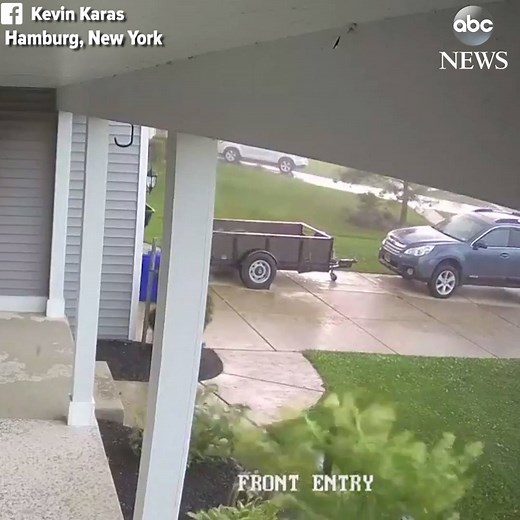 Home surveillance camera captures car being lifted into the air as tornado touches down in Hamburg, New York. http://abcn.ws/2ueLRnv | ABC News
