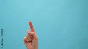 Hand touching and clicking on the blue background, Simulate touch screen phone and tablet.