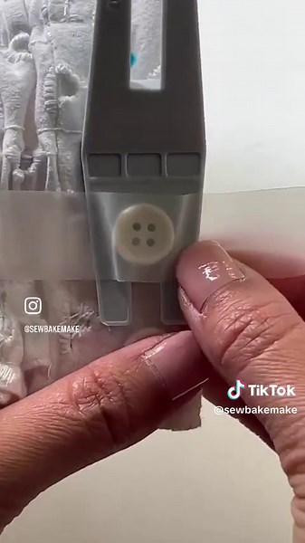 #husqvarnavikingambassador How to sew a button with your sewing machine. My Epic 96Q always has my back and has video tutorials for so many basic techniques. It also takes care of all my settings which makes it so easy! This sewing machine is more high tech than my car 😅 You can use this same technique to sew a button with any machine that can do a zig zag stitch though. Step 1. Remove your presser foot Step 2. Tape your button in place- I used a hum jumper as well so I could create a shank. St