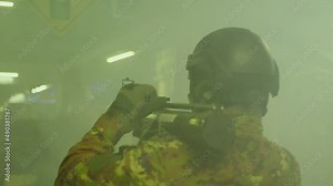 Private Military Company operator shoots from an RPG rocket launcher . Soldier with antitank grenade launcher . R. P. G. shooter shooting . Shot on ARRI movie camera in Slow Motion .