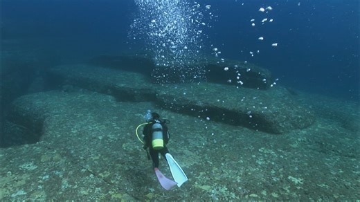 Archaeologists discovered remnants of a gigantic pyramid at Indonesia's megalithic site, Gunung Padang, which Ancient Astronaut Theorists believe is evidence of extraterrestrial visitation. | Ancient Aliens: Out of This World Moments