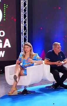 Diana Naborskaia vestido floreado cruzando las piernas - Apoya con la Encuesta en pestaña comunidad