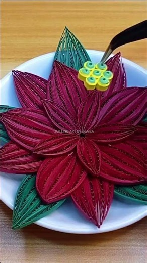 A circle of joy made from simple strips of paper #QuillingArt #CreativeCrafts #PaperCrafts