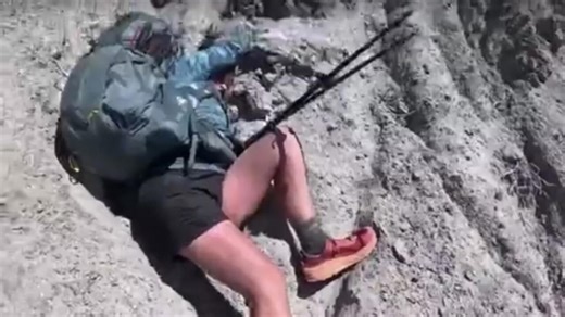 Stranded hiker 'death gripping' cliff in Southern California rescued