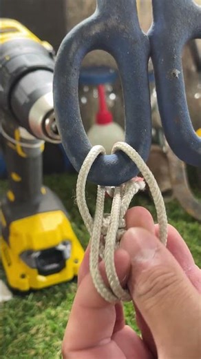 Locksmith technician needed to pass rope over metal frame scissor and used this way to do it.