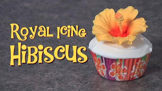Learn How to Pipe a Royal Icing Hibiscus The hibiscus is a beautiful tropical flower that has a dramatic, show-stopping look. These lush tropical icing flower will brighten up any cake, cupcake or treat regardless of the season. Piped with royal icing the hibiscus flower will dry hard and last for months. Join our group: https://www.facebook.com/groups/399224243606200 For more tutorials, tips, techniques, recipes and ideas you can visit our website: http://cakeloversclup.com/ | Cake Lovers Club